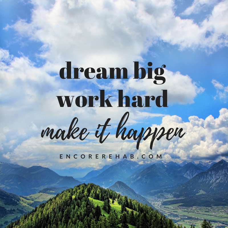 photo of large mountains and blue sky with lots of white clouds with the words dream big, work hard, make it happen, encorerehab.com