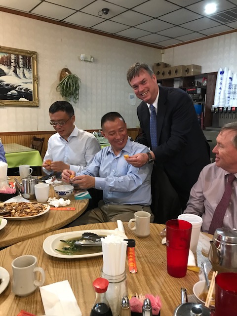 American and Chinese business mean enjoying a meal at a restaurant