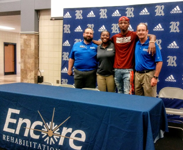 Encore Rehabilitation-Reeltown staff with Reeltown High Senior Eric Shaw