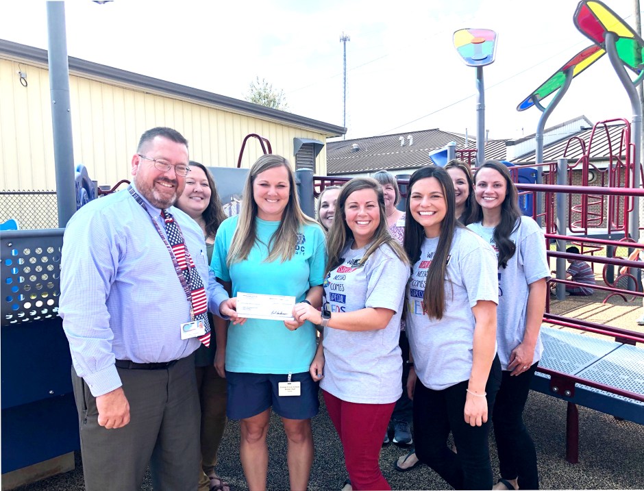 Encore Rehabilitation-Cullman presents a check to the Cullman County Child Development Center towards the construction of a new playground. #EncoreRehab