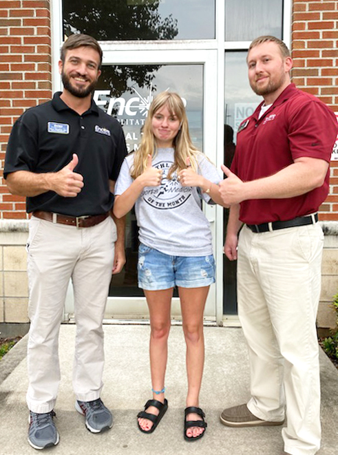 Athlete of the Month Emma Justice stands with your rehab team at #EncoreRehab Geneva